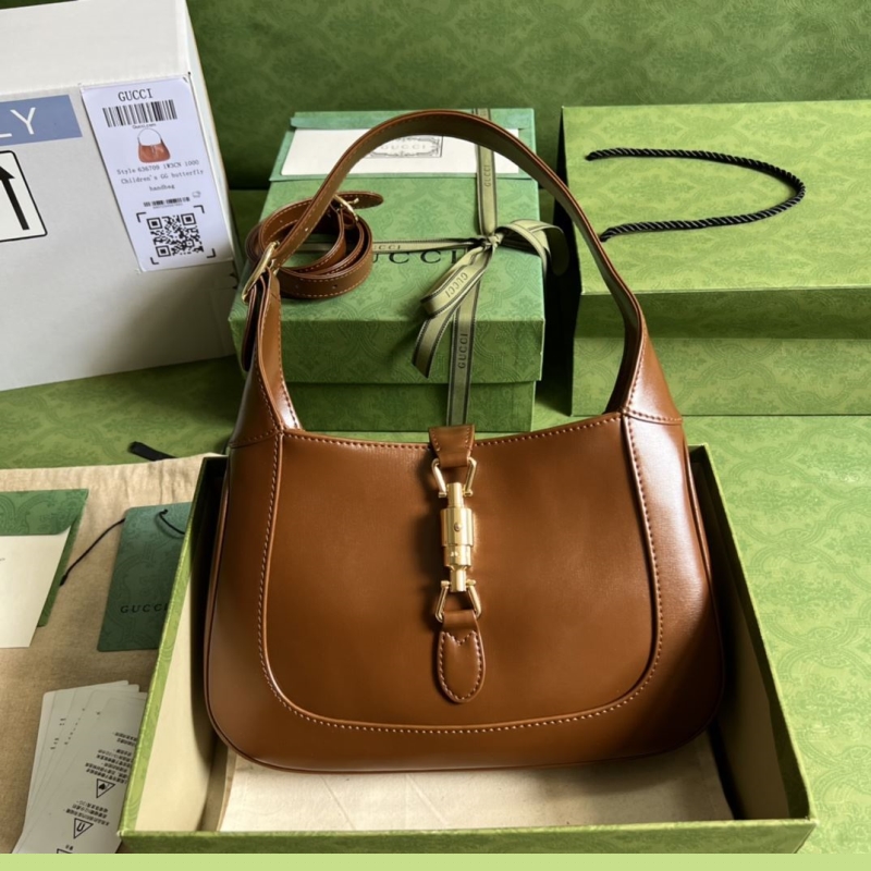 G*u*i top handle bags